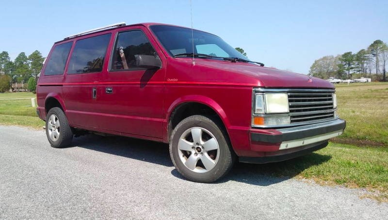 Illustration for article titled Why Buy This 33k-Mile Porsche 911 for Over $165,000 When You Can Get a 254k-Mile Turbo Plymouth Voyager for $3,500?